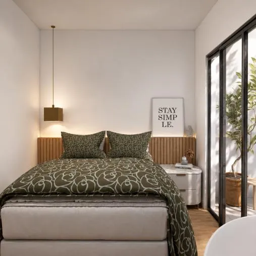 Quarto do studio com cama de casal